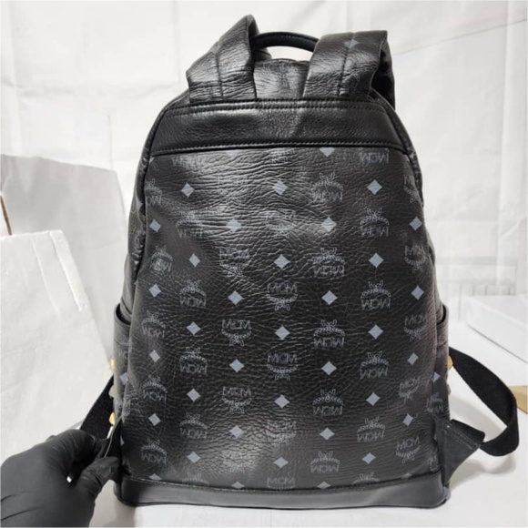 Authentic MCM Visetos Stark Leather Backpack Black/Gold